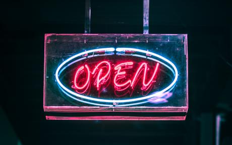 Open Sign Neon sign with open in pink-red inside blue oval - Photo by Pratik Gupta from Pexels