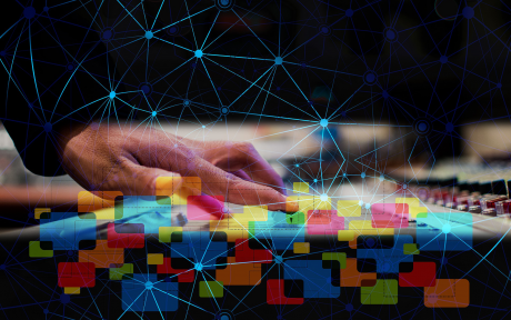 Hand on keyboard with colorful folder icons; Image by Gerd Altmann from Pixabay