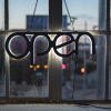 Open Sign in window with orange lights - Photo by Luke Southern on Unsplash